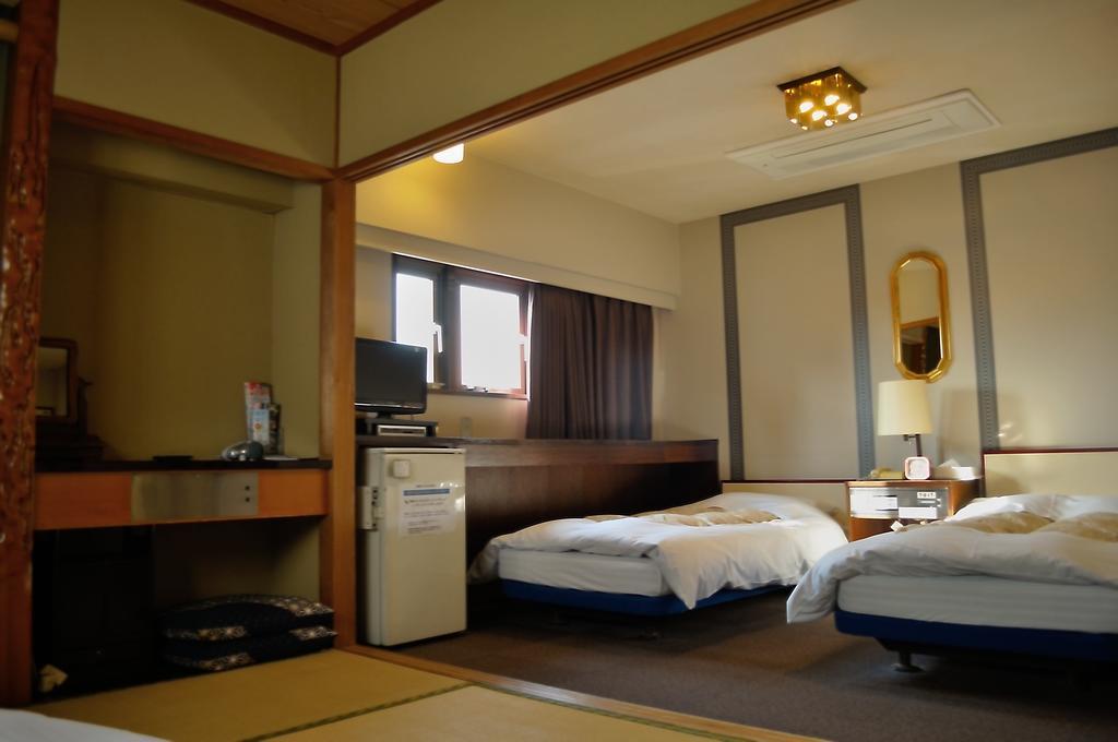 Hotel Los Inn Kochi Стая снимка